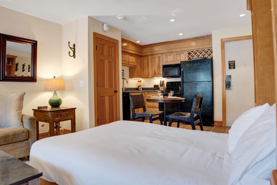 Queen murphy bed looking into the kitchen