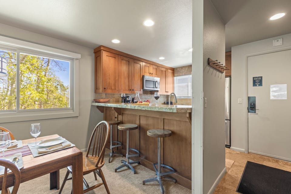 The breakfast bar offers seating for 3 guests.