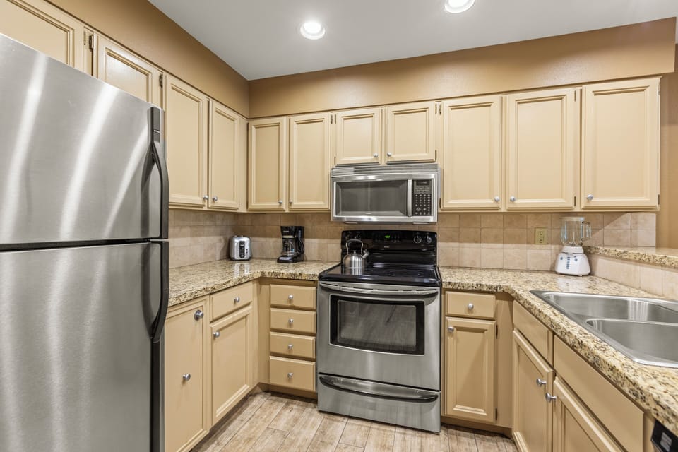 Snow Flower 144 has a well-equipped kitchen with stainless steel appliances.
