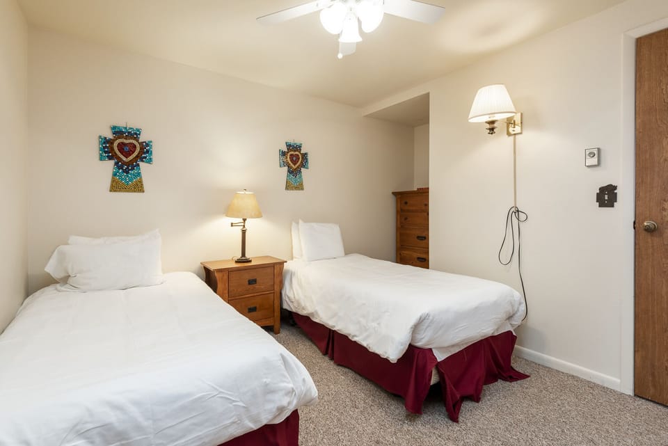 Guest bedroom with two twin-sized beds