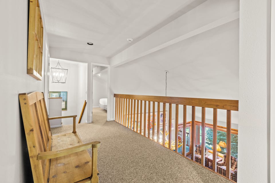 The loft area leading to the upstairs bedrooms.