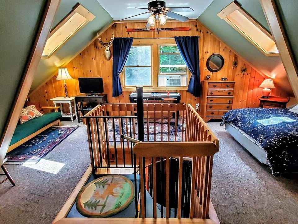 Upstairs is Bedroom #2 with a Queen bed and a Full size Futon 