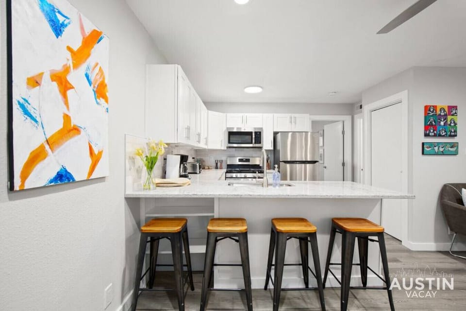 Kitchen with all the essentials plus dishwasher and bar seating