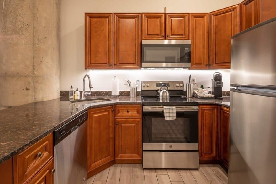All essential cookware, dining utensils, and dishwasher for the best dining soirees.