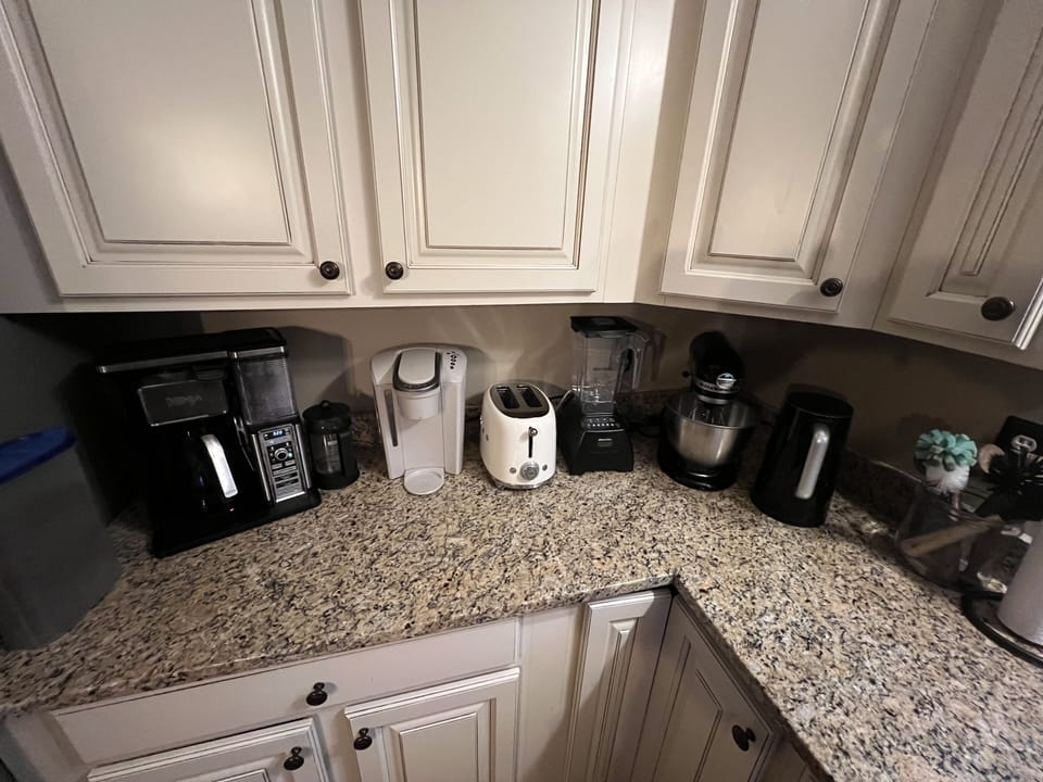 Auto-drip, Keurig coffee makers, toaster, blender, kitchen-aid mixer, and kettle