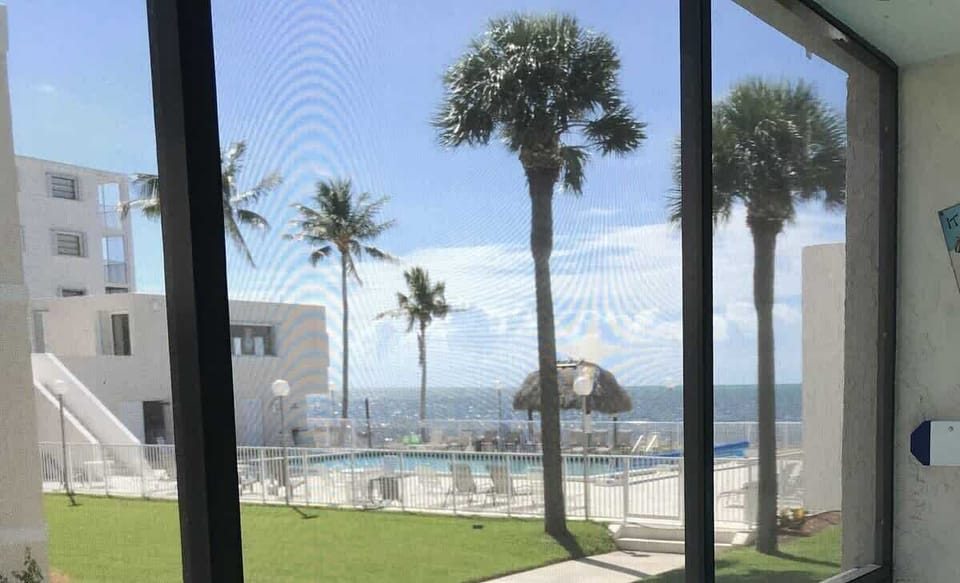 Enjoy blissful afternoons on the screened patio as you savor the views.