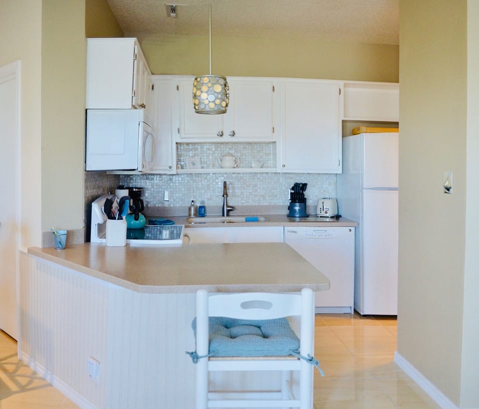 Equipped-to-the-hilt galley kitchen with hospitality coffee, tea and more