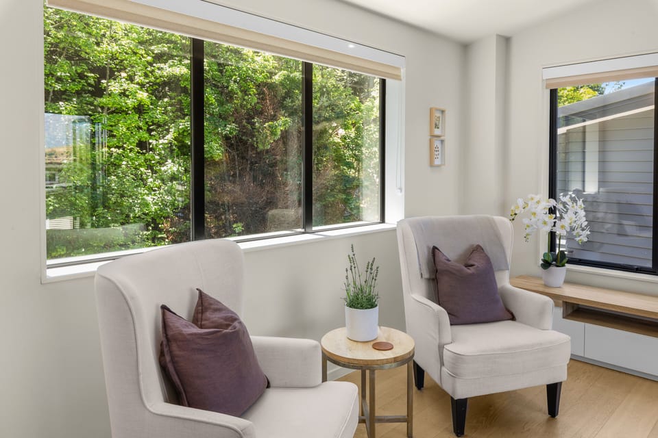 Open plan living, dining, balcony, air con/heat pump, gas fire, TV, views, games