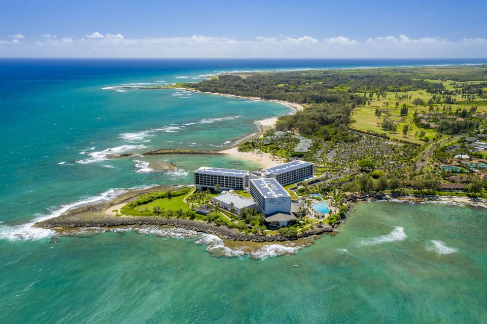 From above, appreciate the expansive Turtle Bay Resort grounds nestled along Oahu’s iconic North Shore.
