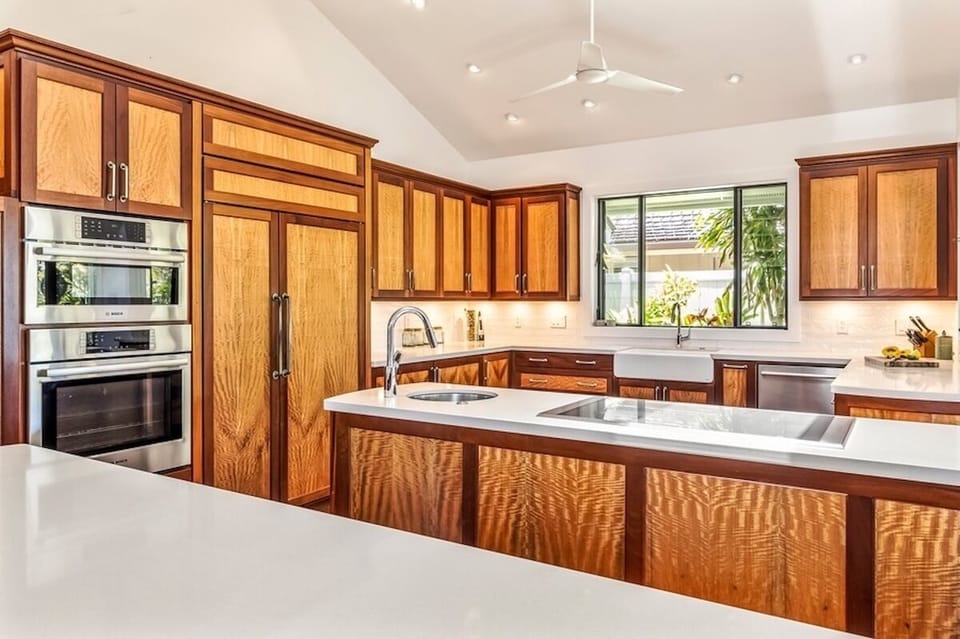 The kitchen features stainless steel appliances.