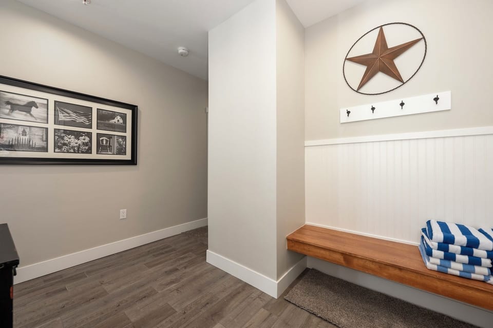 Entryway with space to keep boots, shoes, and coats