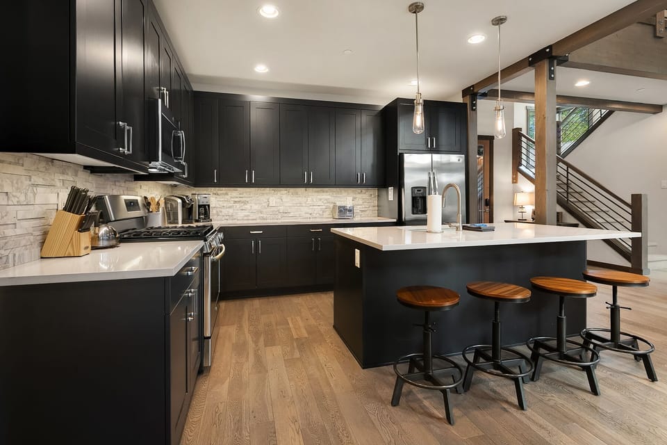 Uncork and Unwind: - Fully stocked chef's kitchen with seating for 4 at the large island. Drip coffee maker and a Keurig.