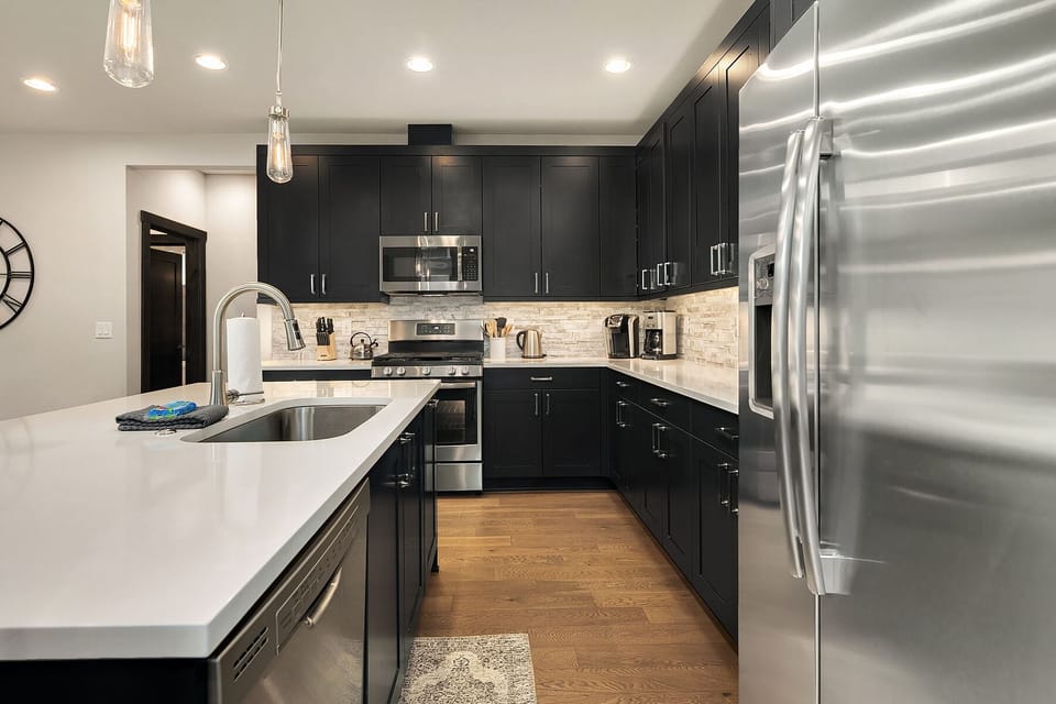 Uncork and Unwind: - Fabulous kitchen with stainless appliances, gas cooktop, and quartz countertops.
