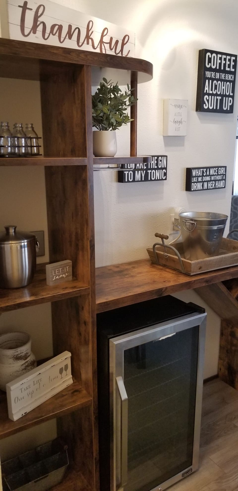 Make a drink at the bar, complete with beverage fridge & ice maker!