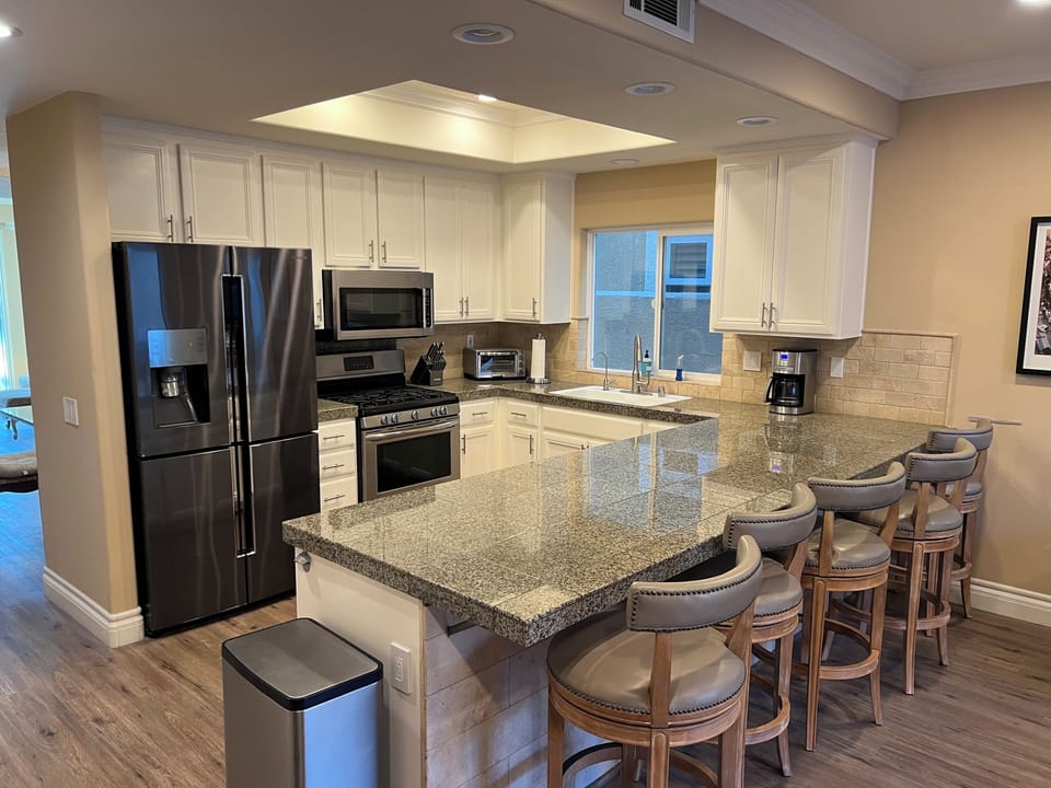Kitchen with all appliances, R/O filtered water, dishes, cooking pots, etc.