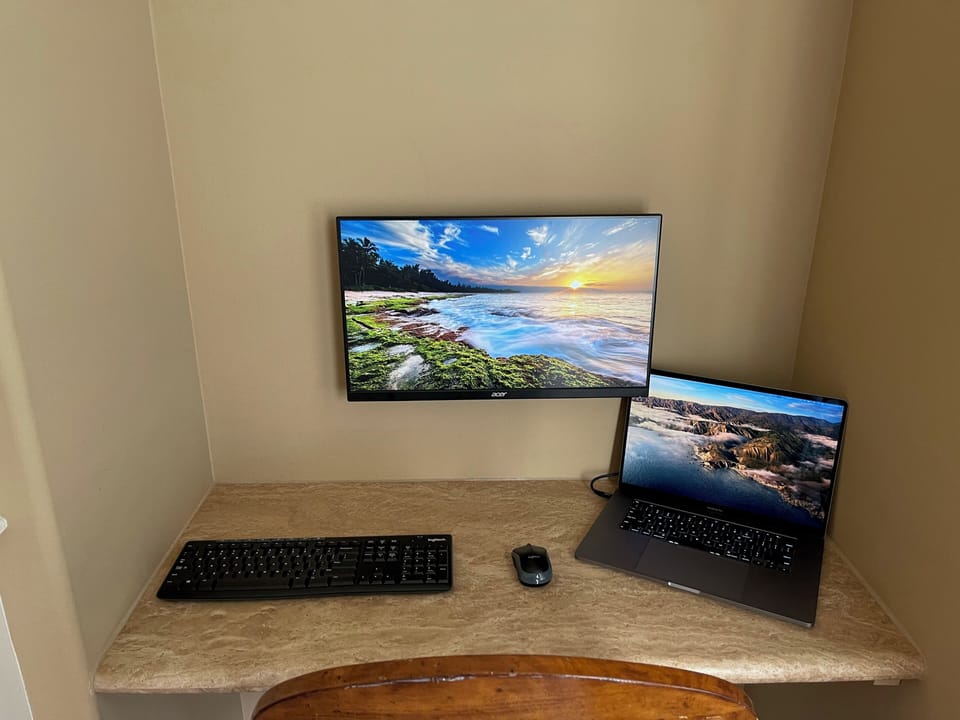 Work station in master with monitor, keyboard, mouse. Air print to back bedroom 