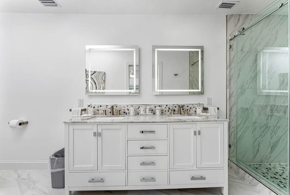 Ensuite bathroom with double vanity and walk-in shower