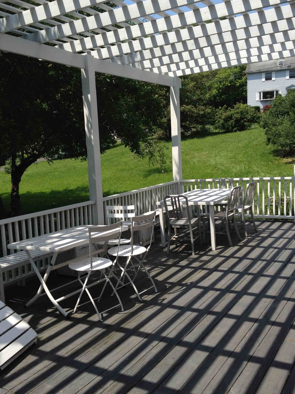 Dining al fresco on the spacious deck. 2 dining areas and 2 adirondeck chairs