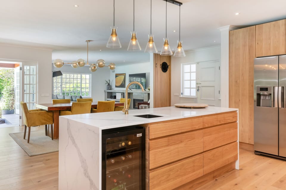 Kitchen, dining area with French doors out to the patio.