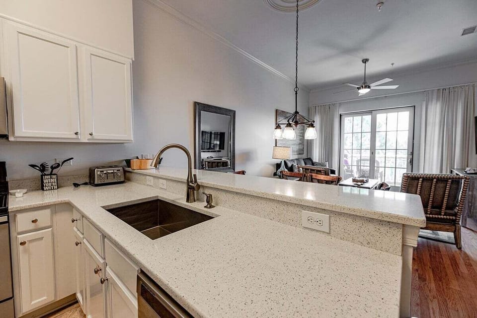 Countertops from the kitchen into the main living area, showcasing a space perfect for socializing while you prep meals