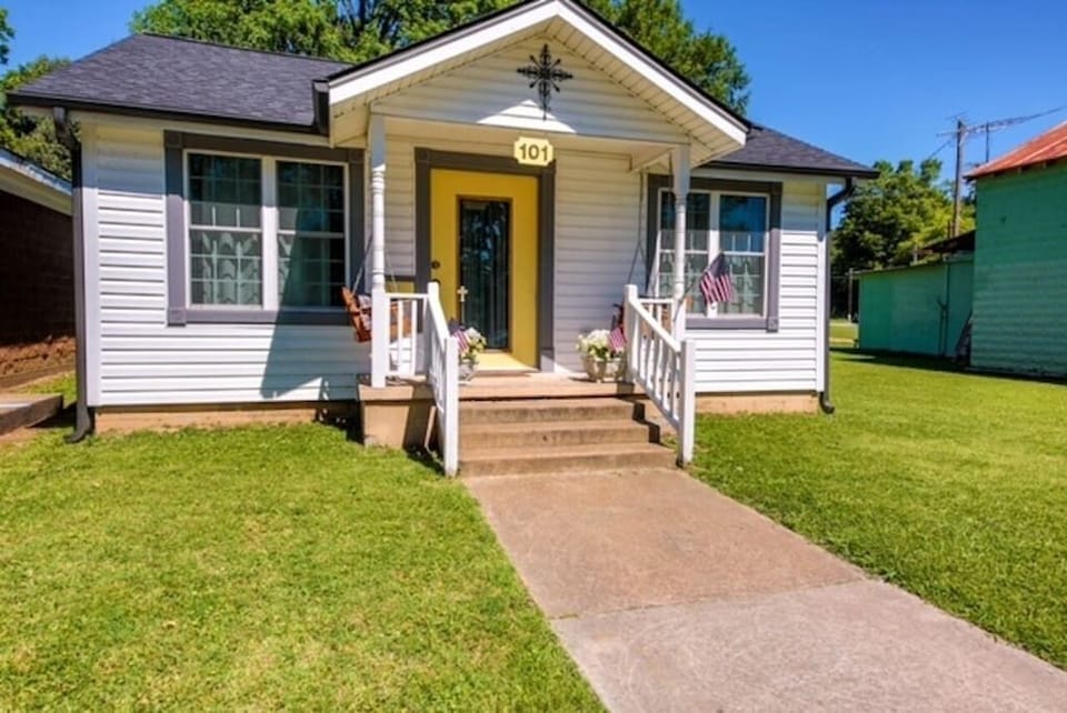 Enough room in the surrounding yard to throw a football, to kick a soccer ball, or to throw a baseball for a game of catch.
