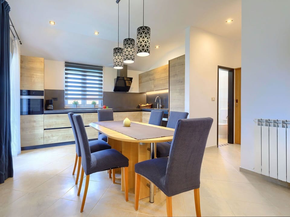 Table, Furniture, Cabinetry, Countertop, Chair, Building, Kitchen & Dining Room Table, Wood, Lighting, Couch