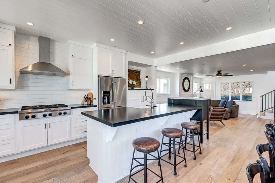 Kitchen includes spacious island with bar stools, making meal prep a social affair!
                