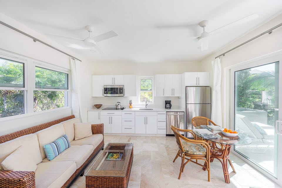 Relax and unwind in the comfort of a generously sized living room and dining area, perfect for leisurely moments and shared meals