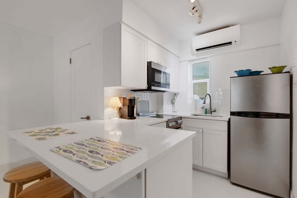 Full, modern kitchen with brand new stone countertops and premium cabinetry.
