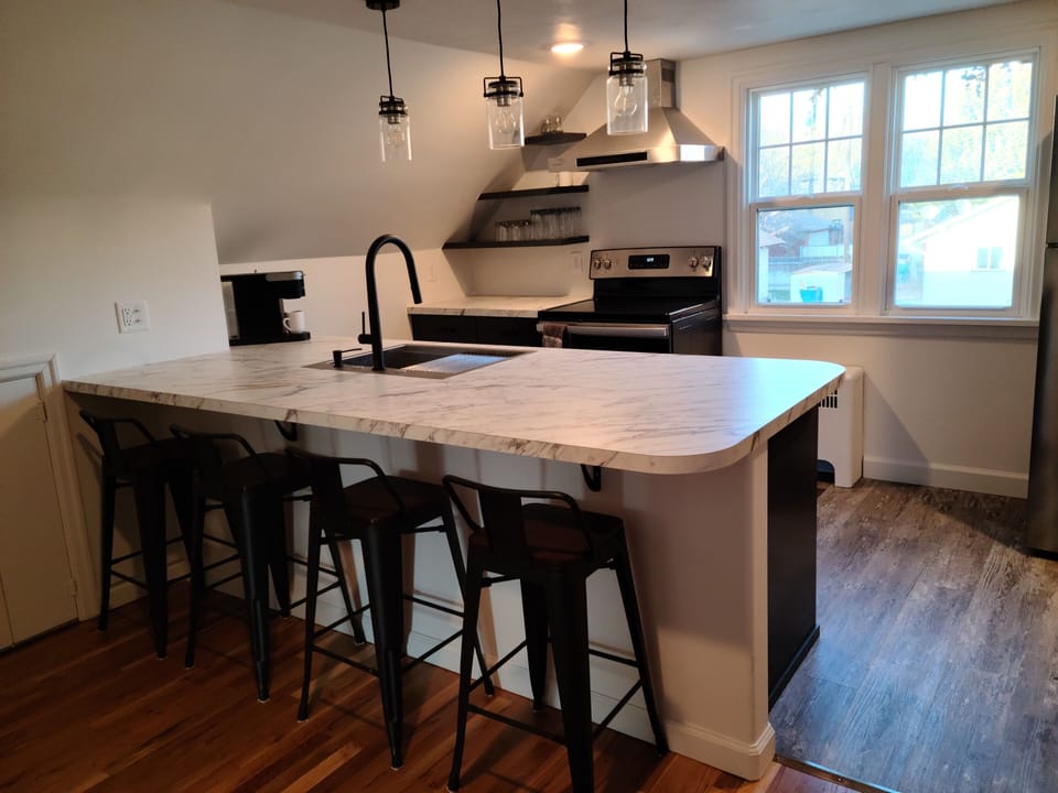 Kitchen, sink, counter, bar stools