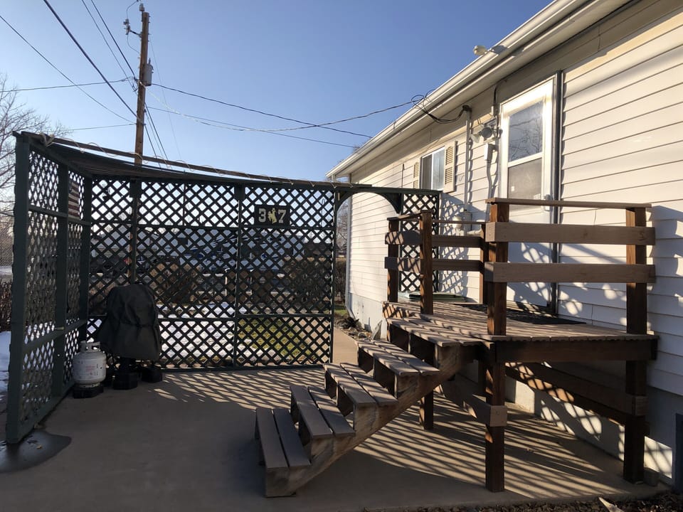 Back patio with propane grill.

