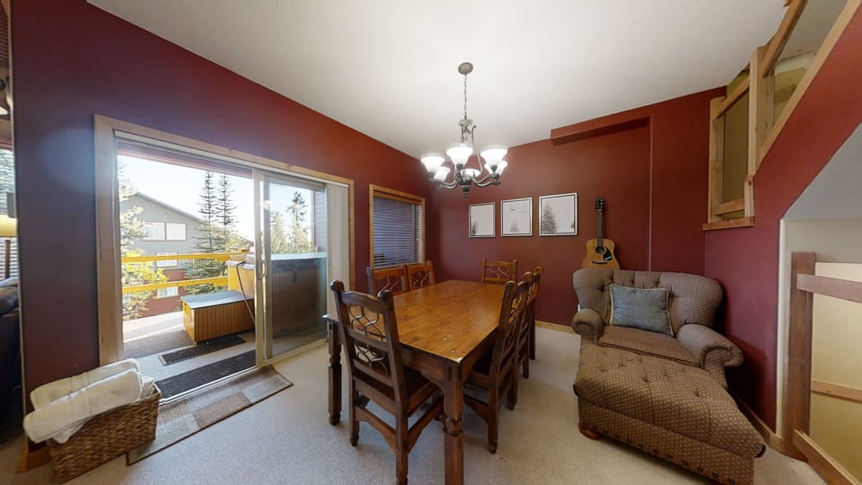 Dining table with room for 6 plus 3 at the kitchen island