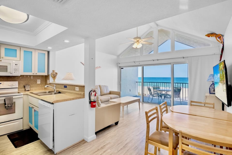 Coconuts Beachfront 109 by AMI Locals