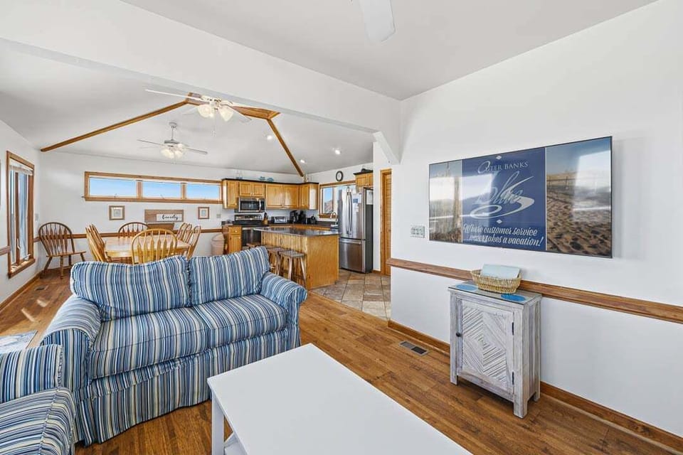 Top-Level Living Room with Deck Access