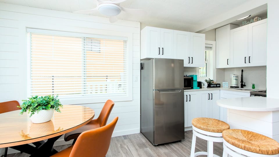 Modern Kitchen – Fully equipped with stainless appliances for cooking real meals.