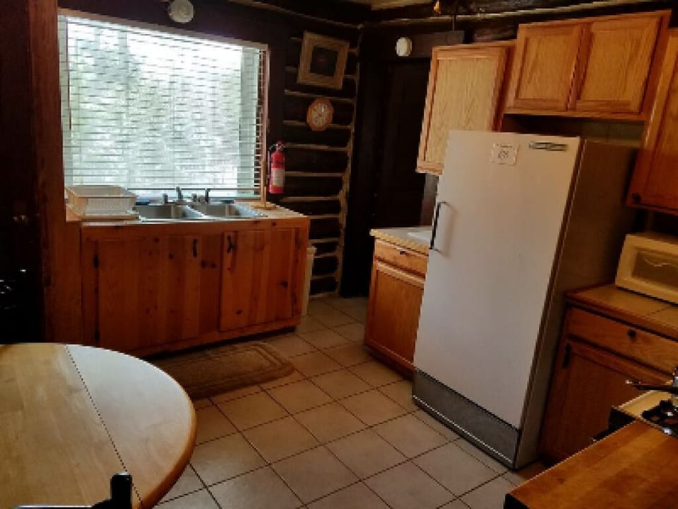 Full size kitchen complete with all pots and pans