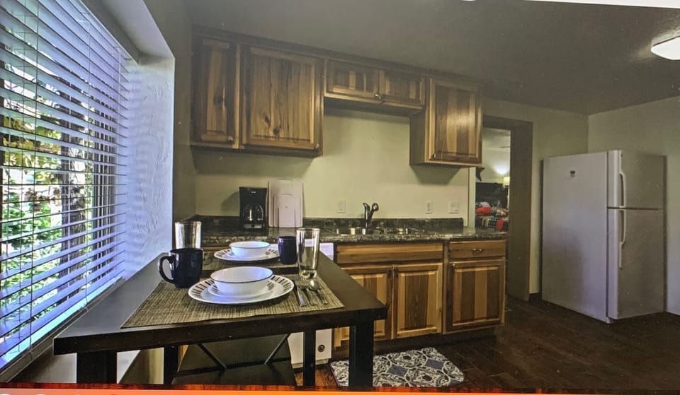 Kitchen with bar-style dining