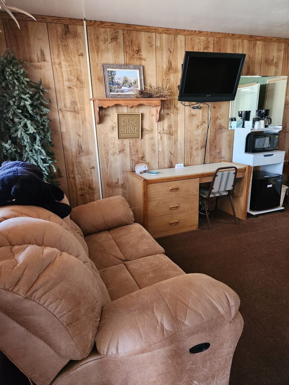 Antler Room (sofa and tv with sitting area as well as coffee station with microwave and mini fridge) 