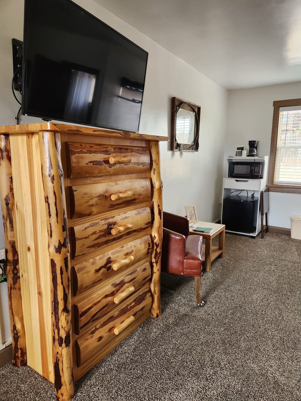 Bohemian Cowgirl Room (dresser with tv sitting area and coffee station with microwave and mini fridge)