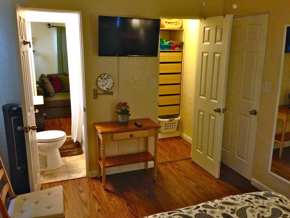 walk in closet with more then enough storage!