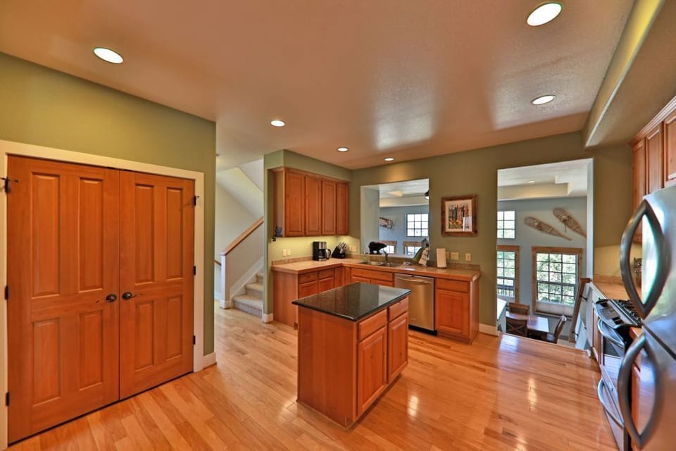 Fully equipped kitchen with views looking north down the Fraser valley.