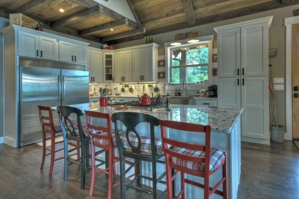 Fully equipped kitchen with stainless steel appliances and granite countertops 