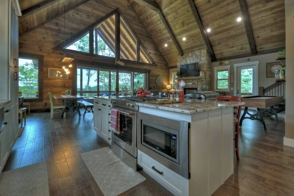 Fully equipped kitchen with stainless steel appliances and granite countertops 