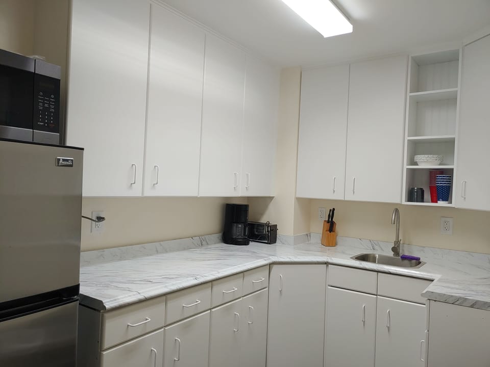 Upstairs kitchen...downstairs kitchen has a small fridge stovetop microwave sink