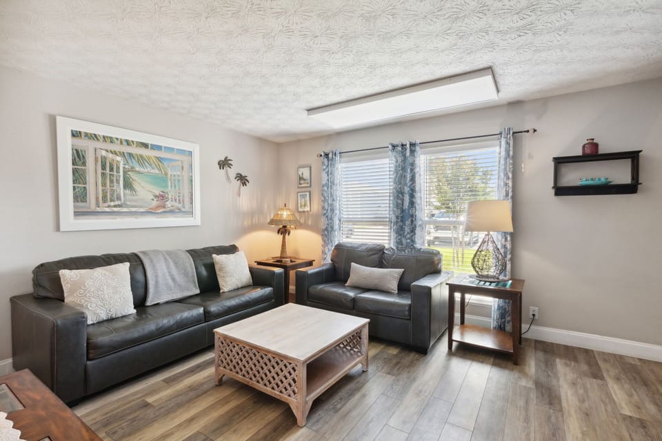 Bright and Airy Living Space with Flat Screen Smart TV