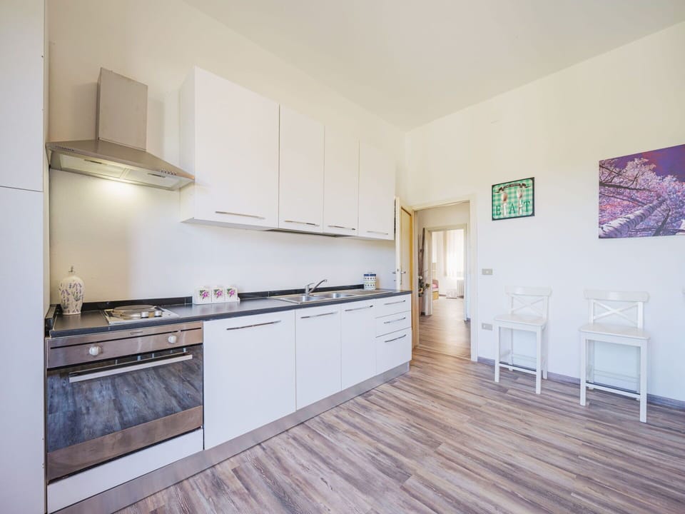 Water, Sky, Plant, Building, Azure, Natural Landscape, Tree, Body Of Water, Beach, Terrain