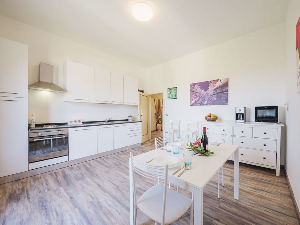 Water, Sky, Plant, Building, Azure, Natural Landscape, Tree, Body Of Water, Beach, Terrain