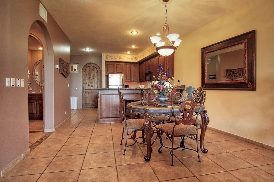 Dining table and kitchen area