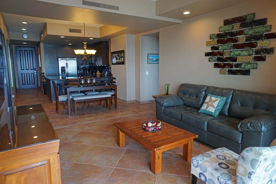 Living room has a queen sleeper sofa with memory foam pullout