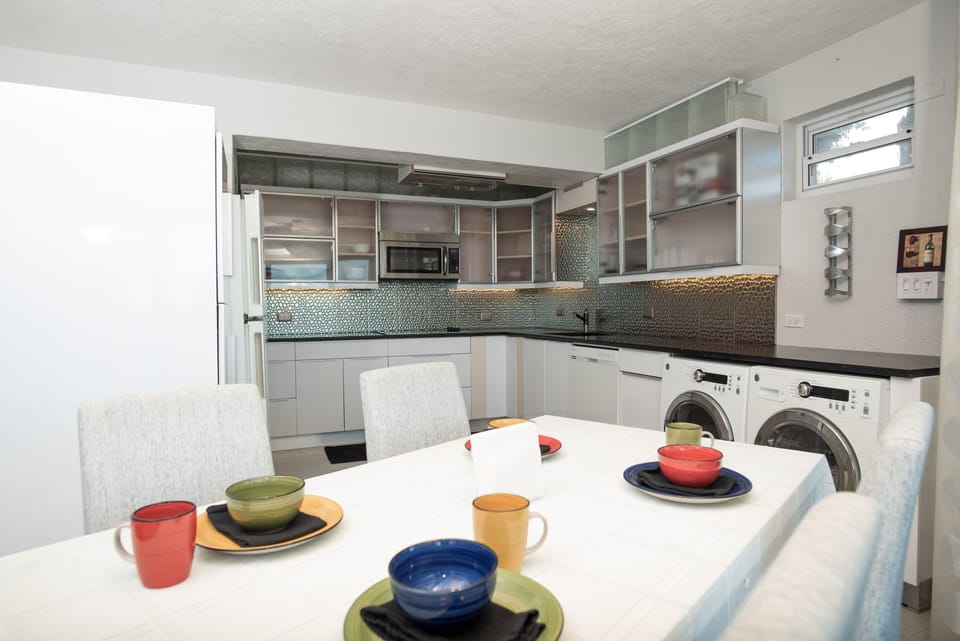 Dining area opens to kitchen.